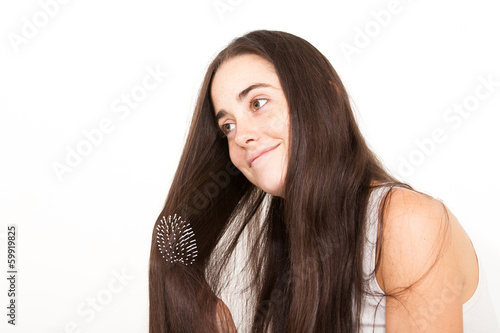 woman brush her long hair