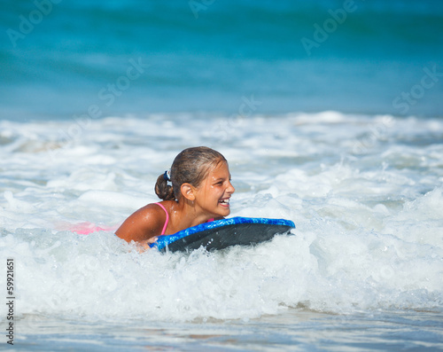 Summer vacation - surfer girl. © Max Topchii
