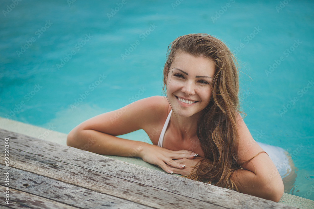 Young female enjoying sunny day on tropical beach Young female enjoying sunny day on tropical beach