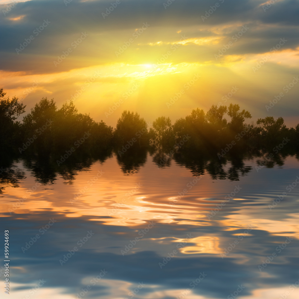 dramatic sunset over a lake dramatic sunset over a lake