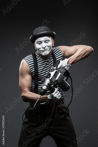 mime with hammer drill