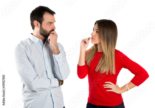 Couple seducing over white background