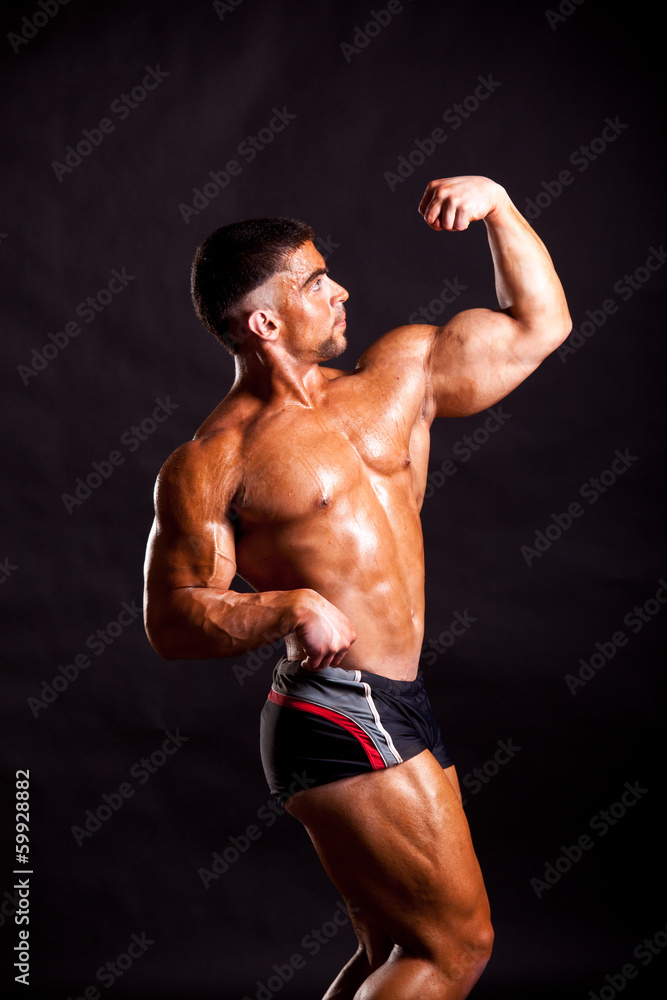 Fototapeta premium young bodybuilder posing