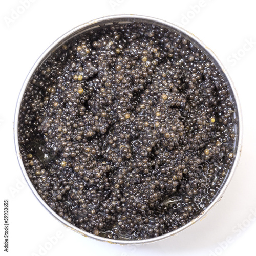 Black caviar in metal can, top view