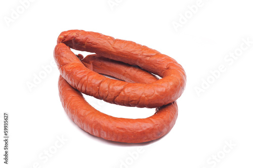 two rings of  smoked sousages with section photo