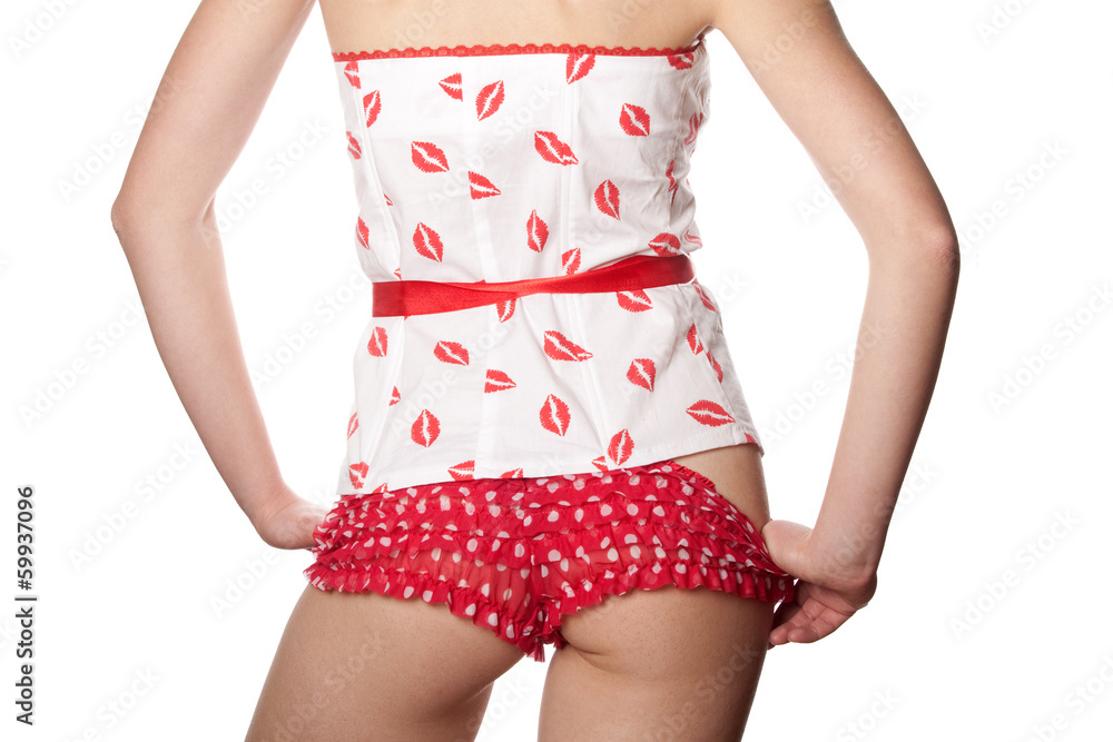 Healthy young girl in corset and panties Stock Photo