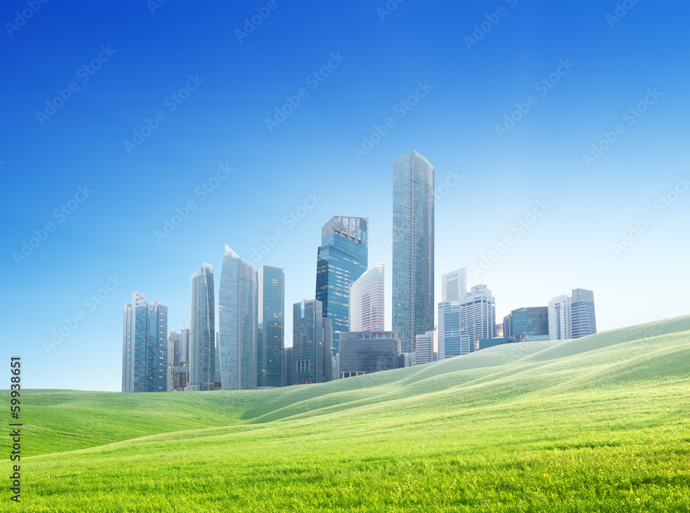 spring field and modern city spring field and modern city