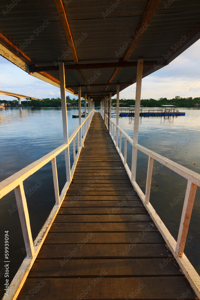 Wooden jetty with beautiful morning lights