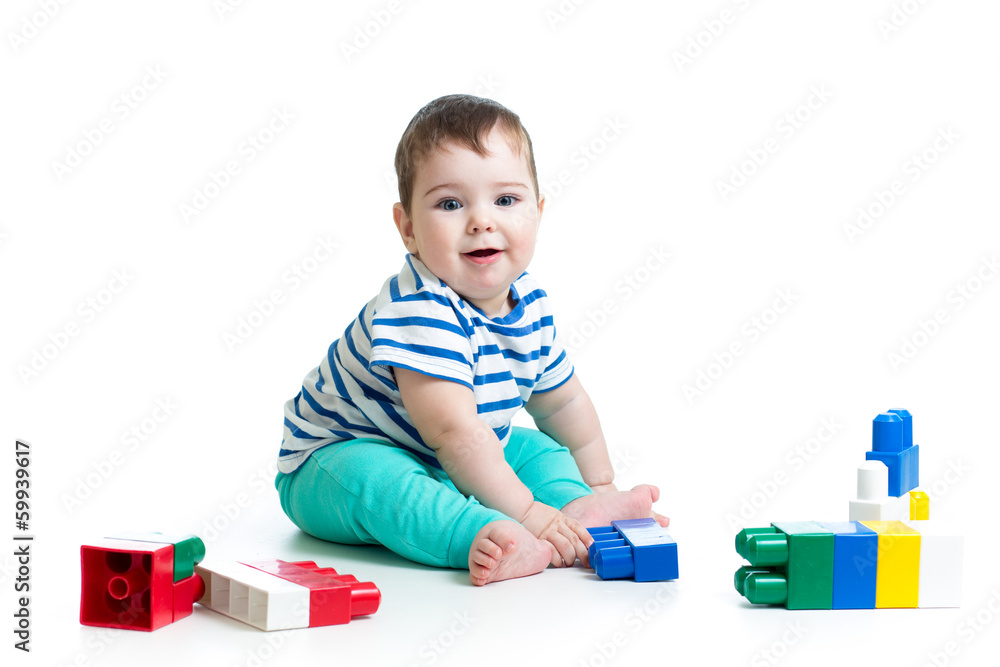 baby with construction set over white background baby with construction set over white background