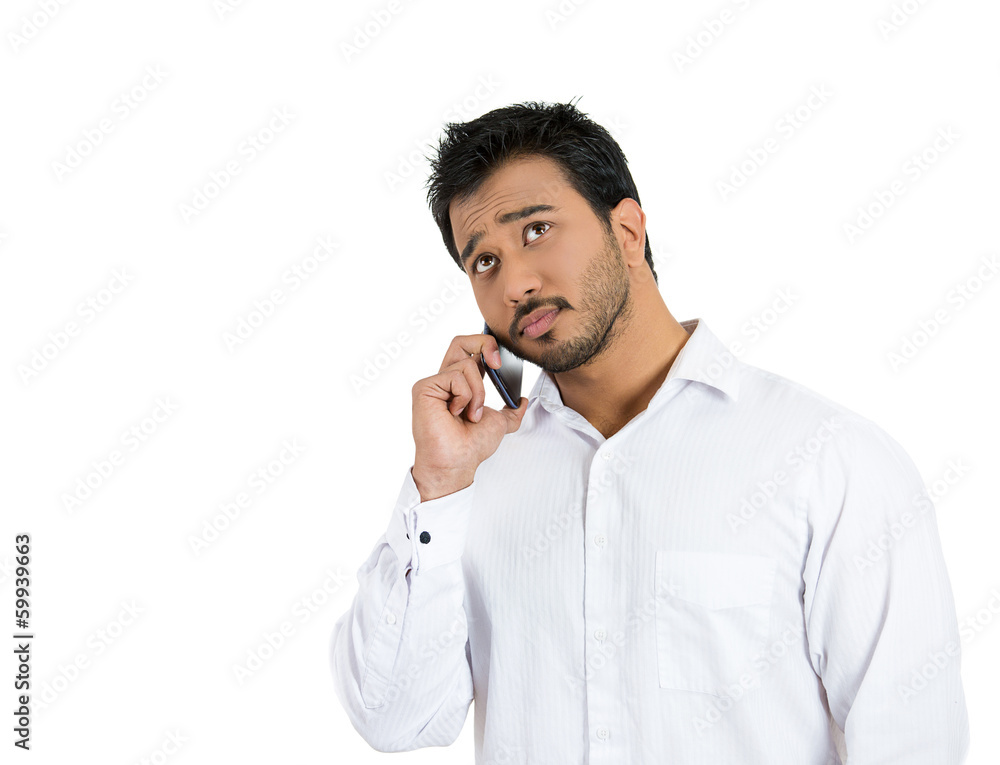 Serious businessman having unpleasant conversation Serious businessman having unpleasant conversation