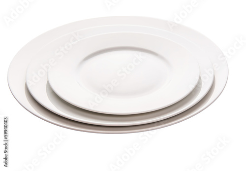 Empty plate with fork, knife and napkin on white background