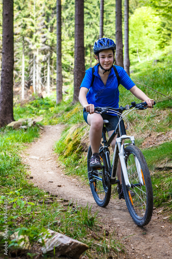 Healthy lifestyle - teenage girl cycling