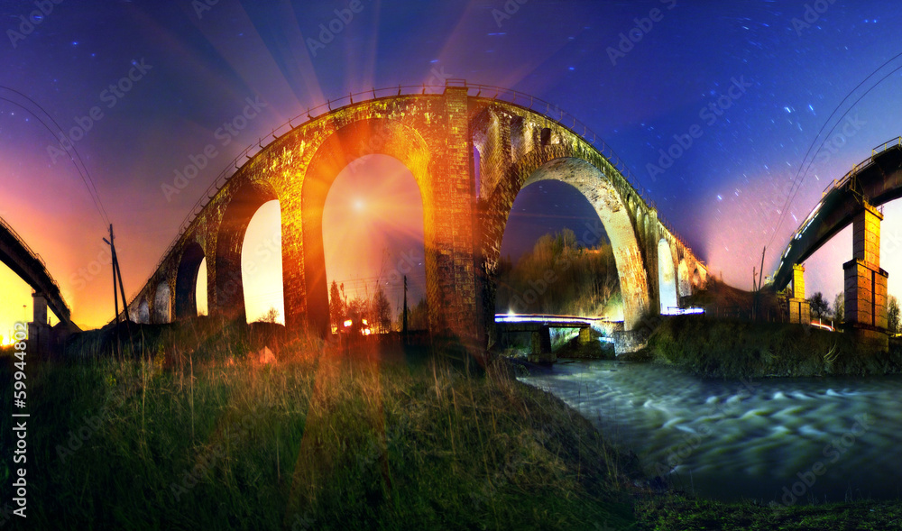 Obraz premium Moonrise over the stone bridge