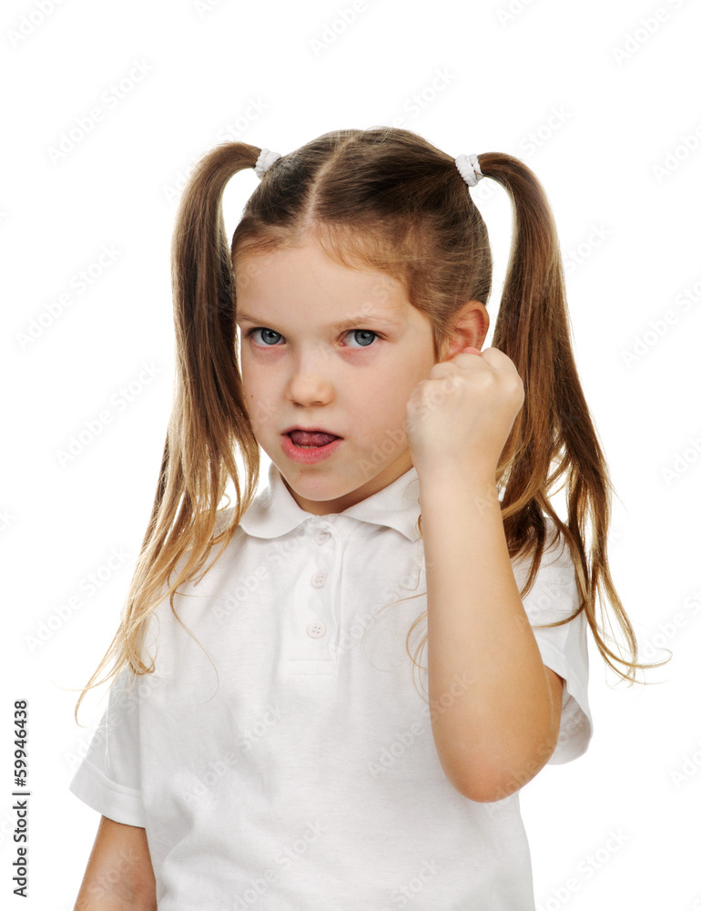 Beautiful sad school girl threatening fist. Beautiful sad school girl threatening fist.