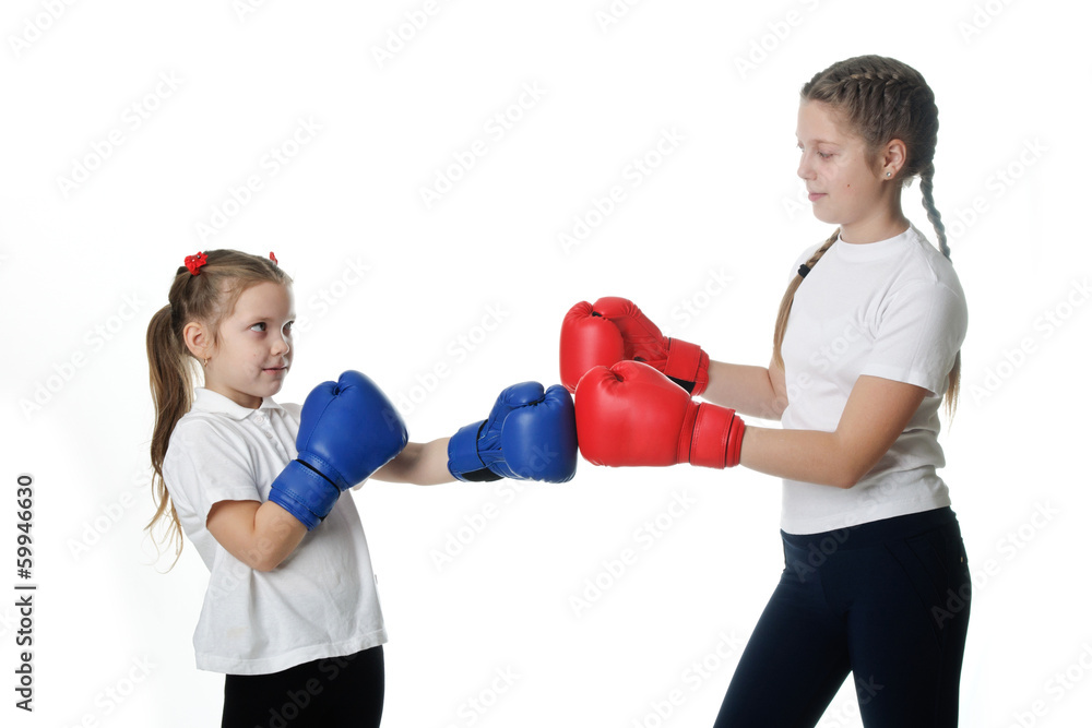 Beautiful young little girls fighting in studio. Beautiful young little girls fighting in studio.