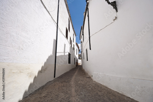 Wallpaper Mural Traditional street in Ronda village, Malaga, Andalusia, Spain Torontodigital.ca