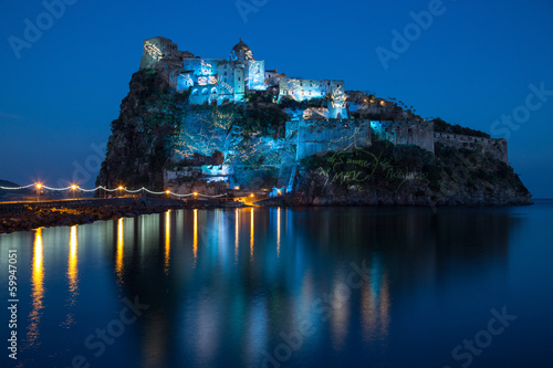 aragonese castle in the night photo