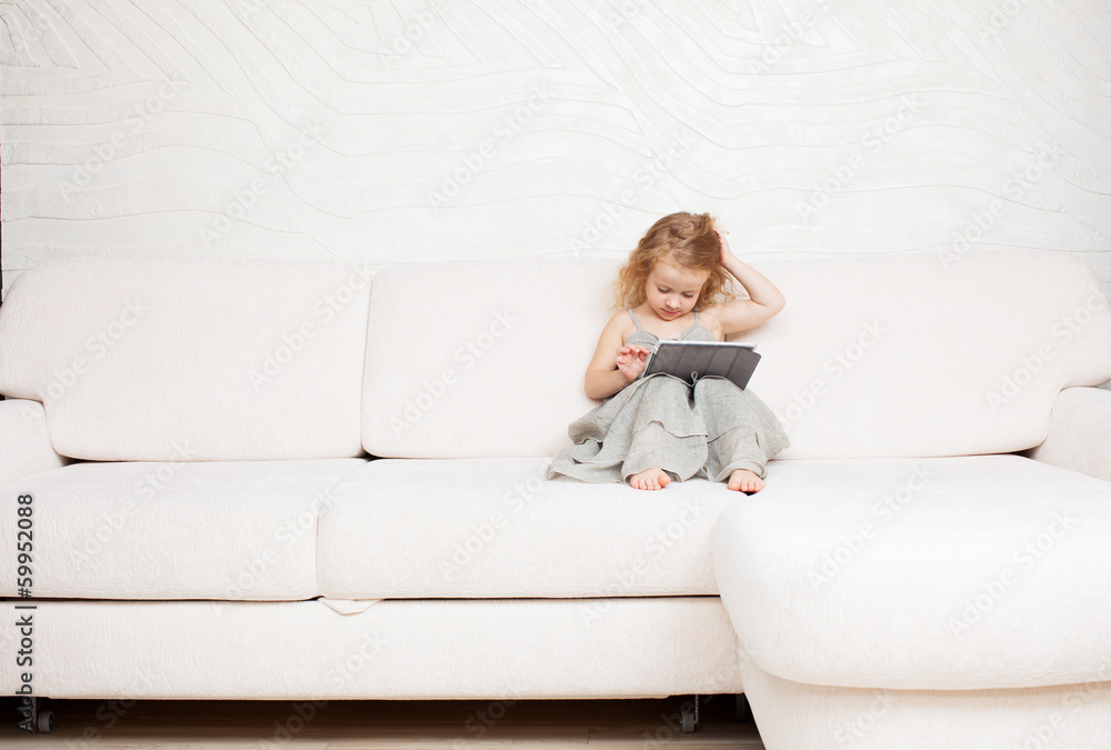 Baby with tablet computer