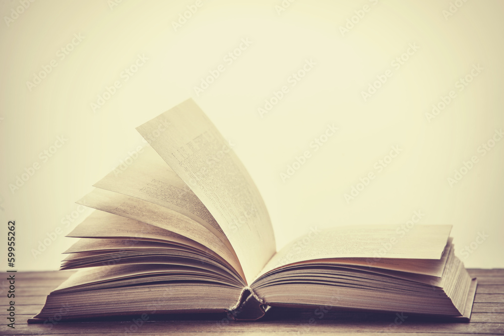 Open book. Photo in old color image style. Open book. Photo in old color image style.