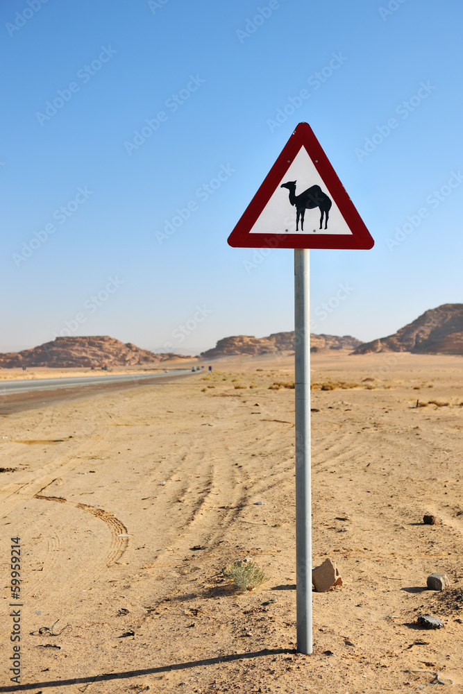 Camels crossing sign in the desert of Wadi Rum