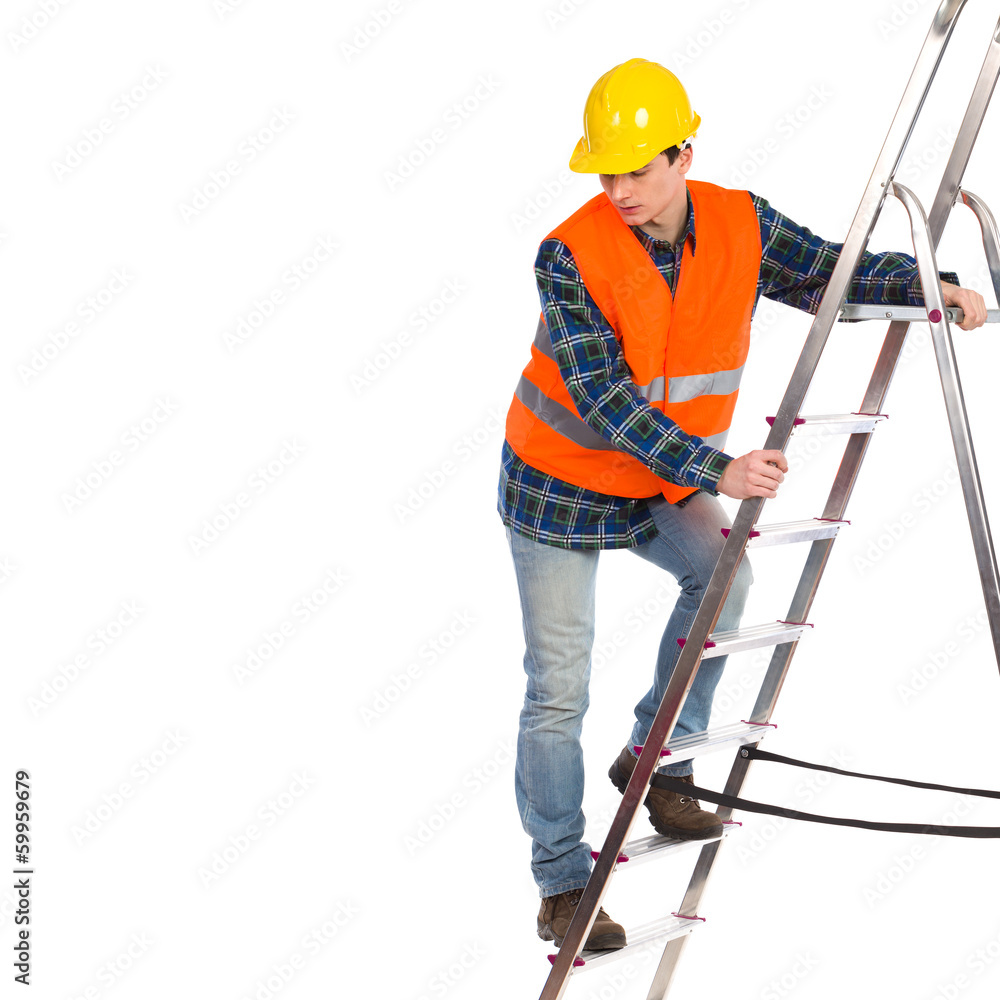 Construction worker in reflective clothing climbing a ladder. Construction worker in reflective clothing climbing a ladder.