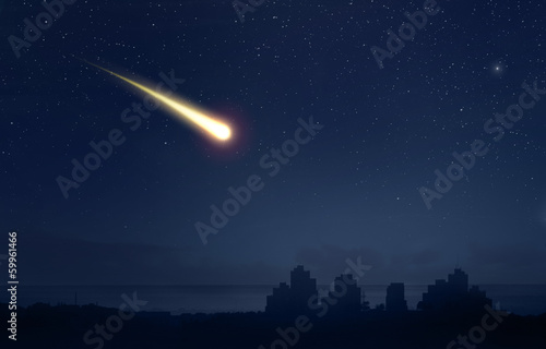 Meteor comet over the nigt sky city landscape