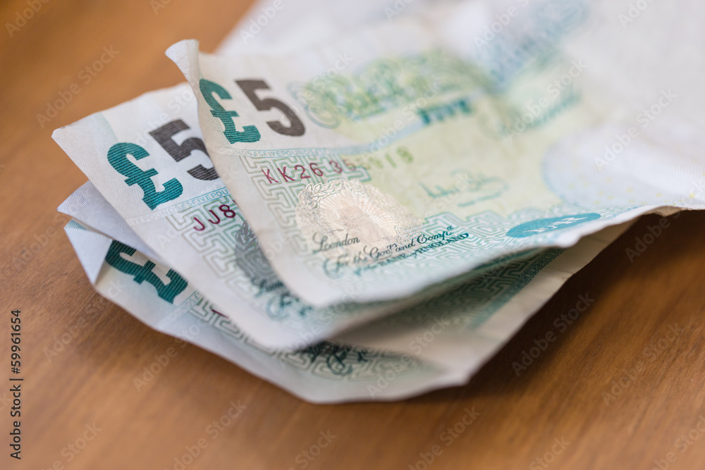 Crumpled £5 notes Crumpled £5 notes