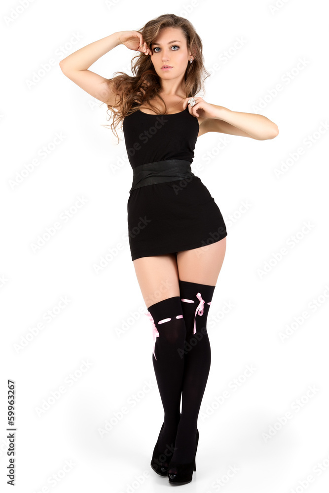 Fototapeta premium Fashion Model. Isolated on grey background.