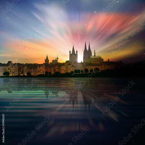 abstract background with silhouette of cologne and sunrise