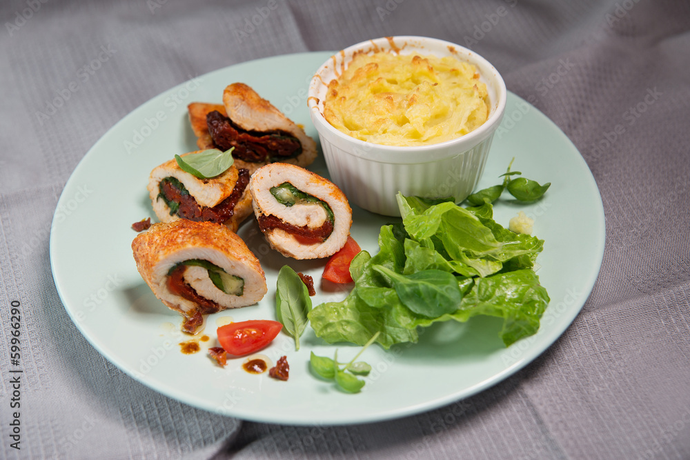 Chicken fillet stuffed with basil, mozzarella and dried tomatoes Chicken fillet stuffed with basil, mozzarella and dried tomatoes