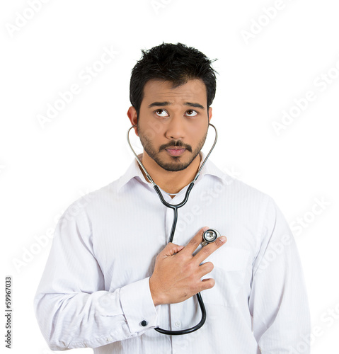 Fényképezés Young man performing self diagnosis, self control