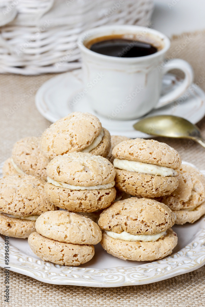 Cup of coffee and stack of french macaroons Cup of coffee and stack of french macaroons