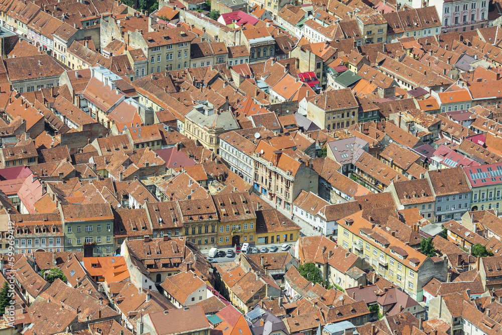 Aerial view with street crossing old center of Brasov, Romania.