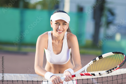 Smiling Professional Female Tennis Player © danmorgan12
