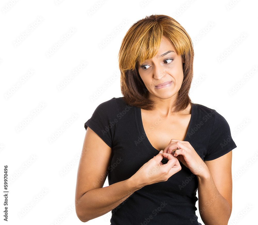 Woman avoiding eye contact, feels guilty and sorry for situation Woman avoiding eye contact, feels guilty and sorry for situation