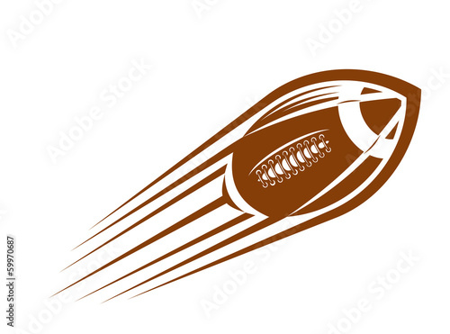 American football or rugby ball flying through the air