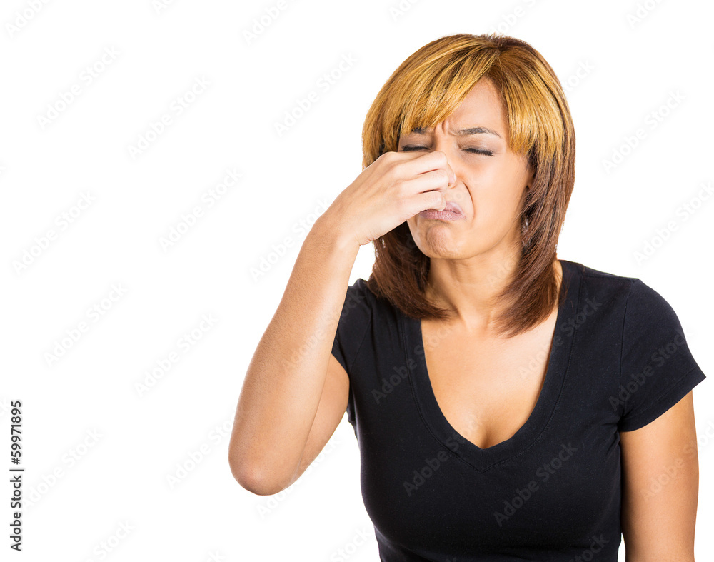 Woman pinches her nose, something stinks, very bad smell Woman pinches her nose, something stinks, very bad smell