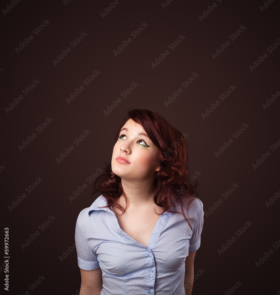 Young woman thinking with copy space Young woman thinking with copy space
