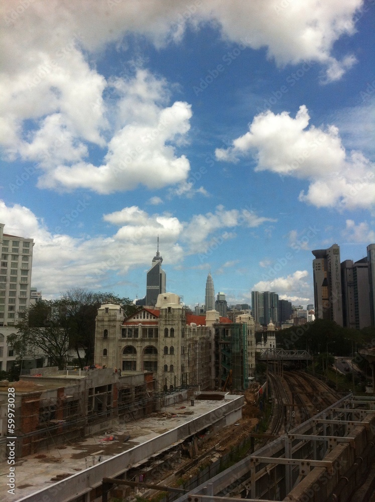 Cloudy Sky And Construction Of City In Asia