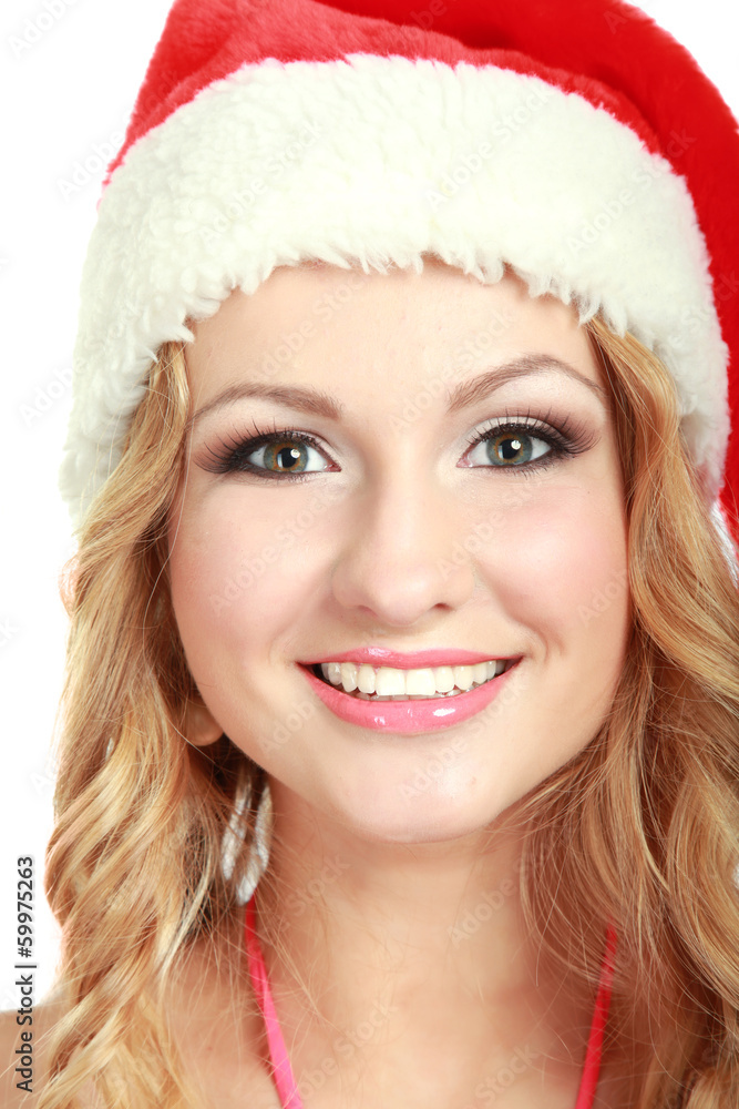 Portrait of a beautiful woman wearing a santa hat Portrait of a beautiful woman wearing a santa hat