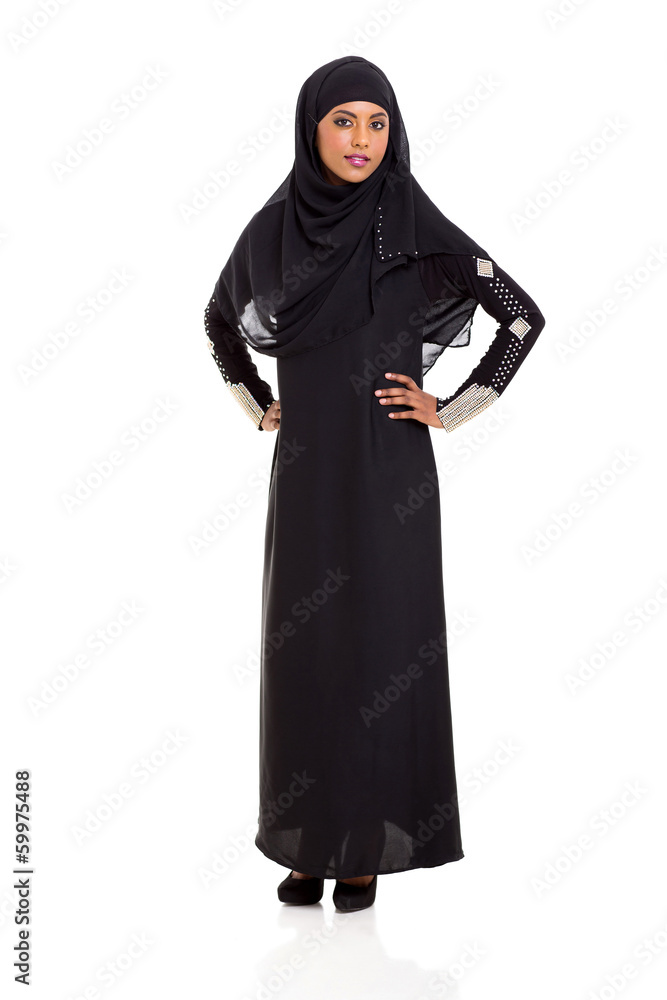 young muslim woman standing on white young muslim woman standing on white