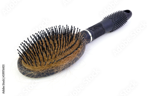 Used hairbrush isolated on white background