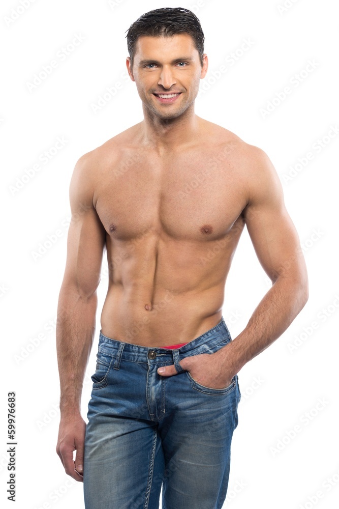 Handsome young man in blue jeans with naked torso Handsome young man in blue jeans with naked torso