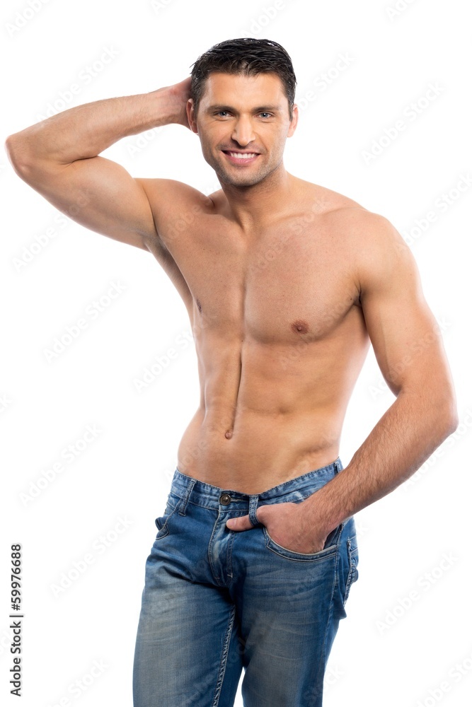 Handsome young man in blue jeans with naked torso Handsome young man in blue jeans with naked torso
