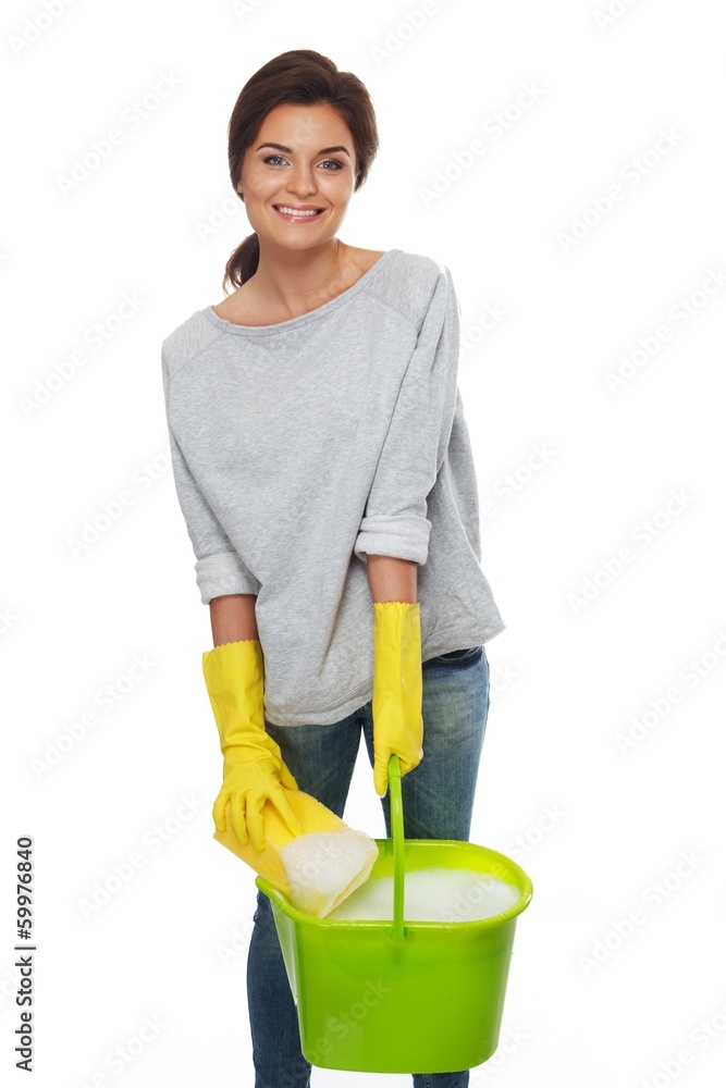 Beautiful cheerful brunette woman in gloves with sponge Beautiful cheerful brunette woman in gloves with sponge