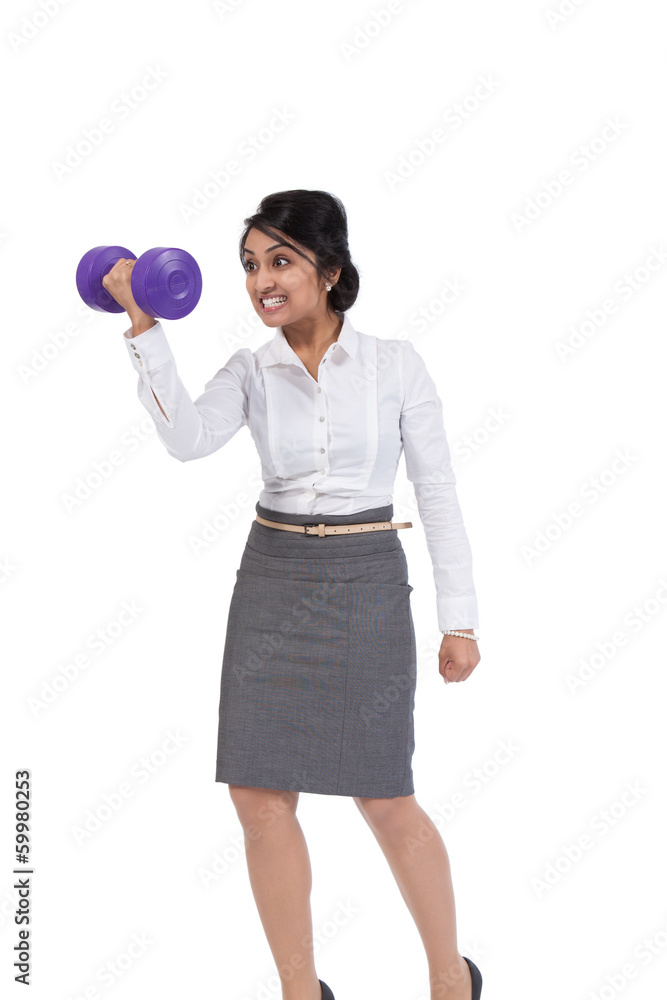 Asian businesswoman holding a dumbbell Asian businesswoman holding a dumbbell