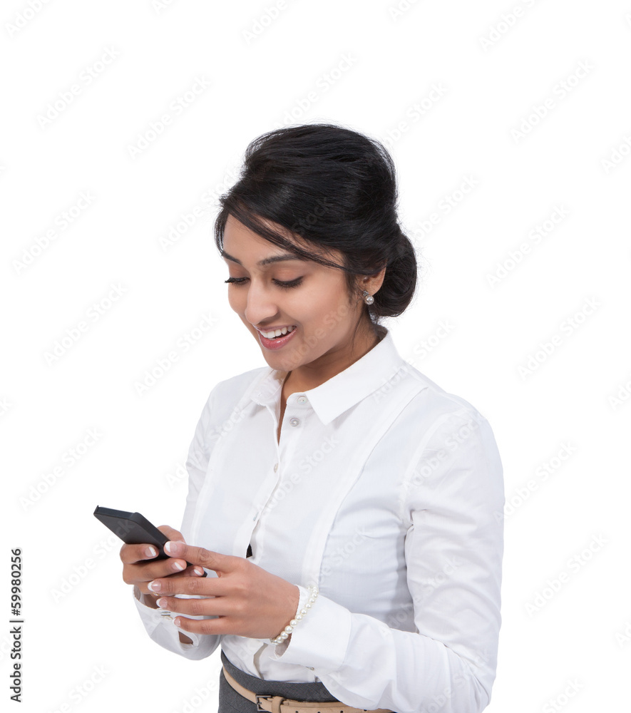 Asian businesswoman text messaging Asian businesswoman text messaging