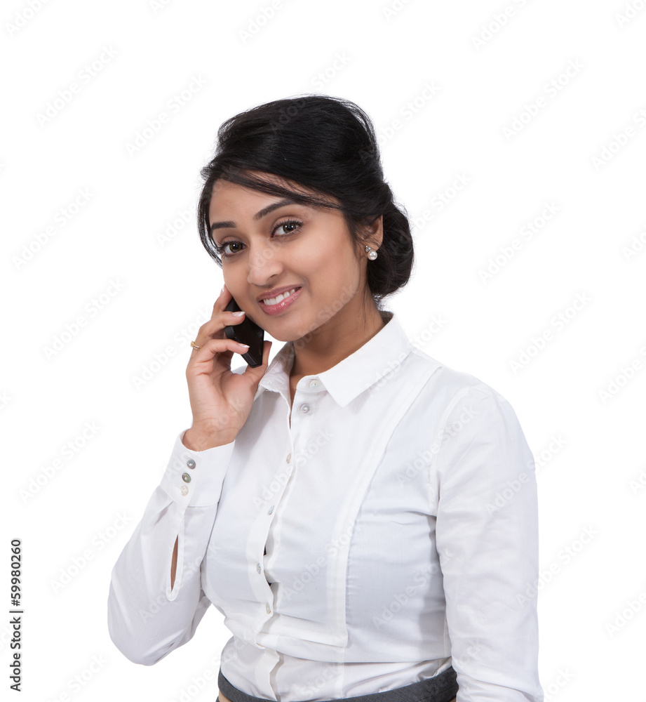 Portrait of an Asian businesswoman talking on cell phone Portrait of an Asian businesswoman talking on cell phone