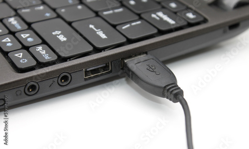 USB cable plugged in to laptop