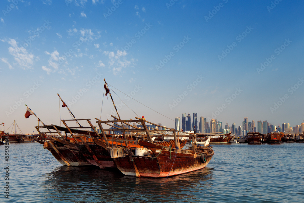 Fototapeta premium Doha, Qatar: Traditional sail boats called Dhows